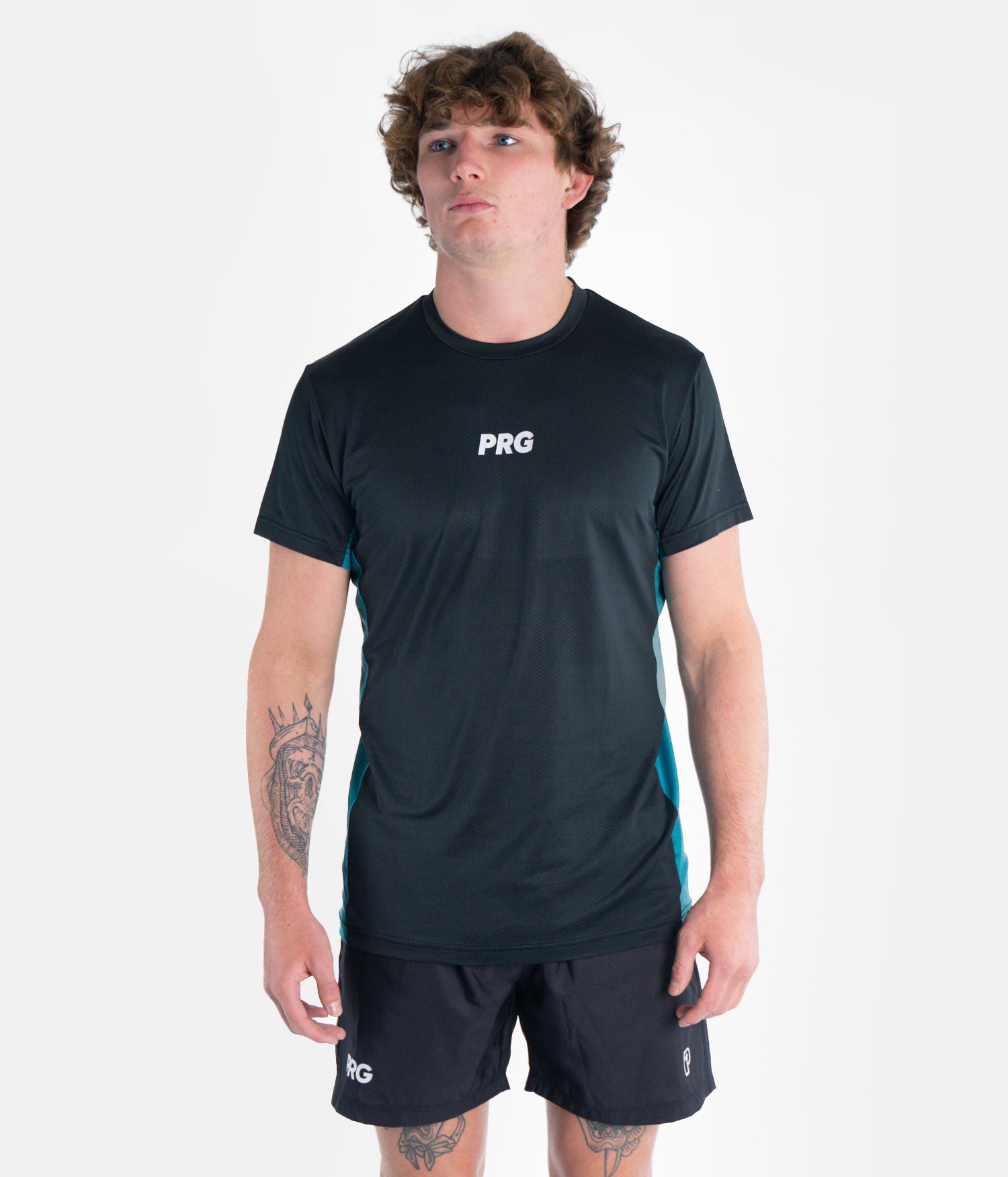 Our PRG Tech Tee is the latest addition to the PRG range. A perfect combination of comfort, style and performance. These unique tees combine breathable and odour-resistant material of rashguards which is sweat-wicking with the comfort of a traditional Progress tee. Experience unrestricted movement and stay fresh during intense grappling sessions, workout or during your down time. Order your PRG Tech Tee for ultimate comfort and performance.